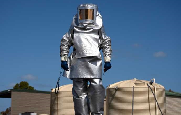 Image of Countermeasures Production Worker in a Silver Suit 